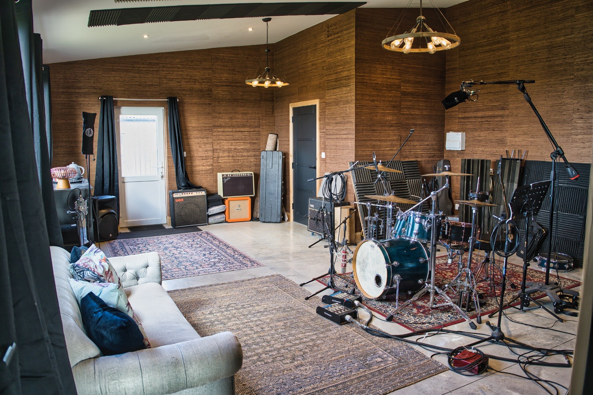 Live room at Pound House Productions with drums and recording setup