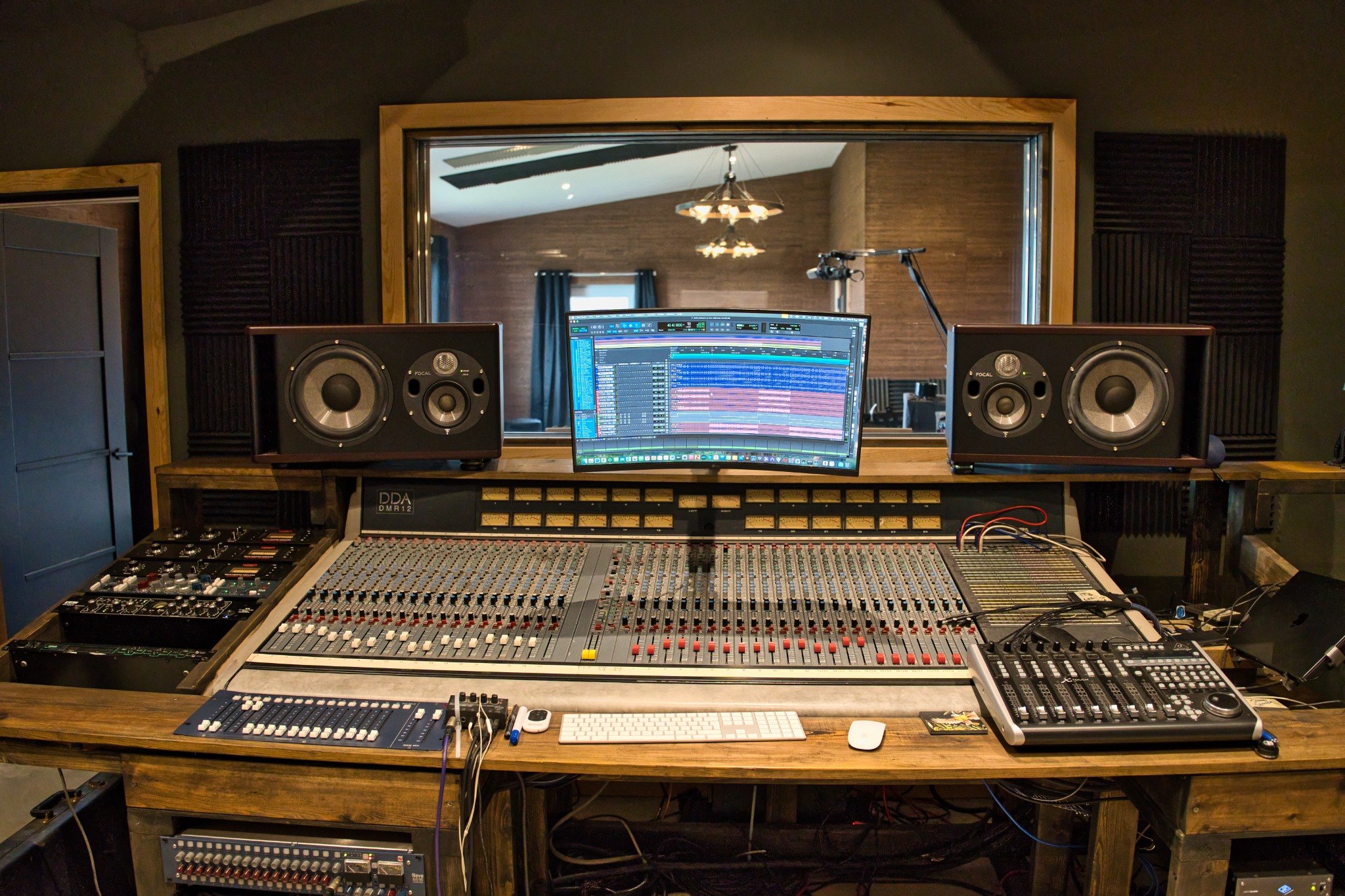 Control room at Pound House Productions with console and Focal monitors